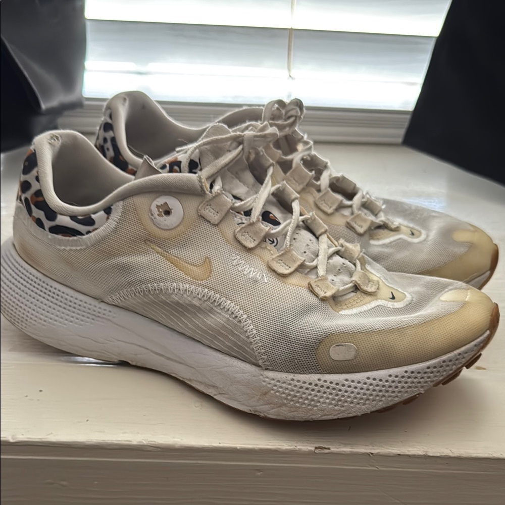 Nike Cream Athletic Shoes with Supportive Design